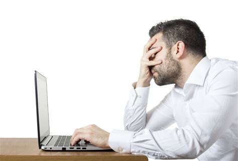 a frustrated man in the computer
